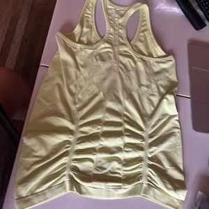 Athleta size M light lime green racer back tank top